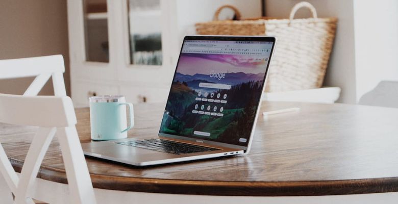 A laptop open to the Google homepage